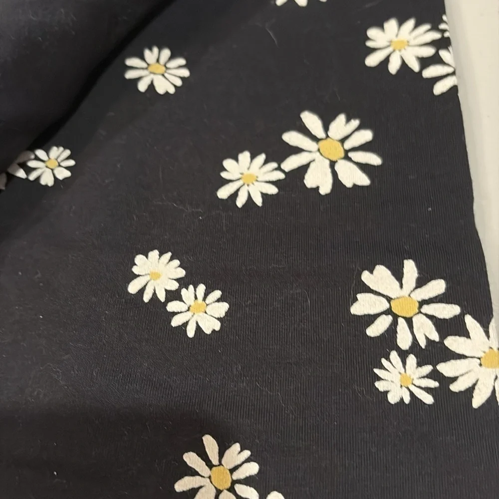 Old navy girls leggings.  size XL (14-16). Black and black with flowers
